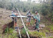 Gotong Royong TNI dan Warga, Pipanisasi Air Bersih TMMD ke-126 di Bukit Sari Terus Dikebut
